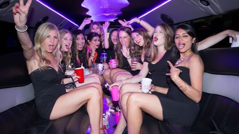 Hens party celebrating on the party bus